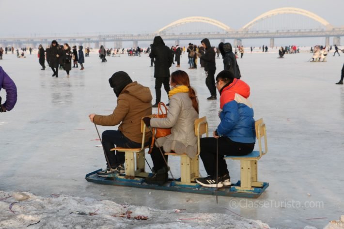 Playing on Songhua River in winter, Harbin, China Playing on Songhua River in winter, Harbin, China